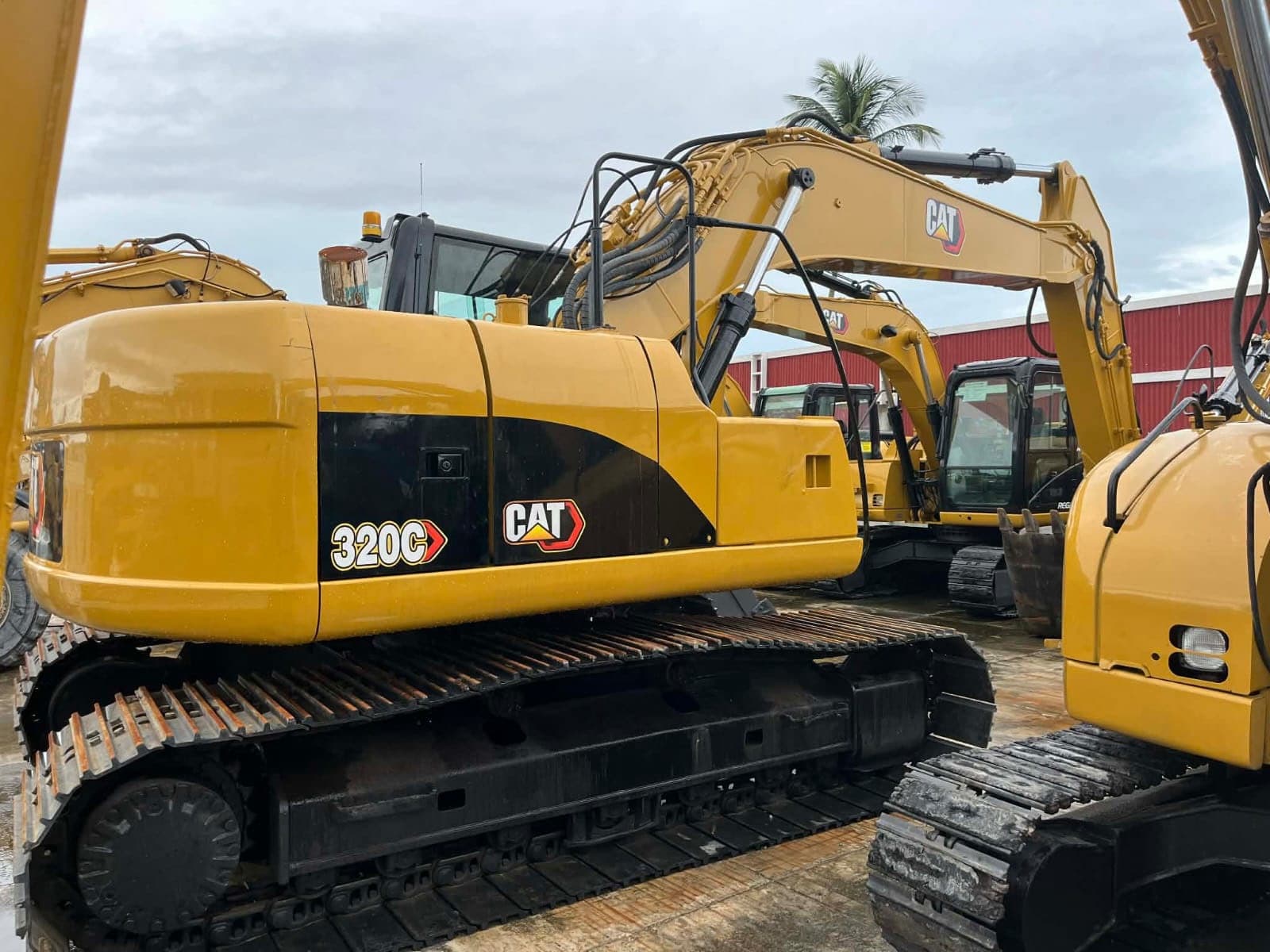 Caterpillar 320C tracked excavator parked among the BCLI fleet.
